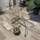 Gold wrought iron ashtray on legs with magazine rack and marbled shelf