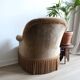 Brown toad chair