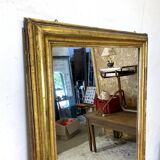 19th century mercury mirror with wooden frame and gilded stucco