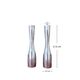 Pair of minimalist aluminium candlesticks in the style of Erika Pekkar.
