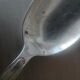 Box of 8 small art deco spoons in silver metal