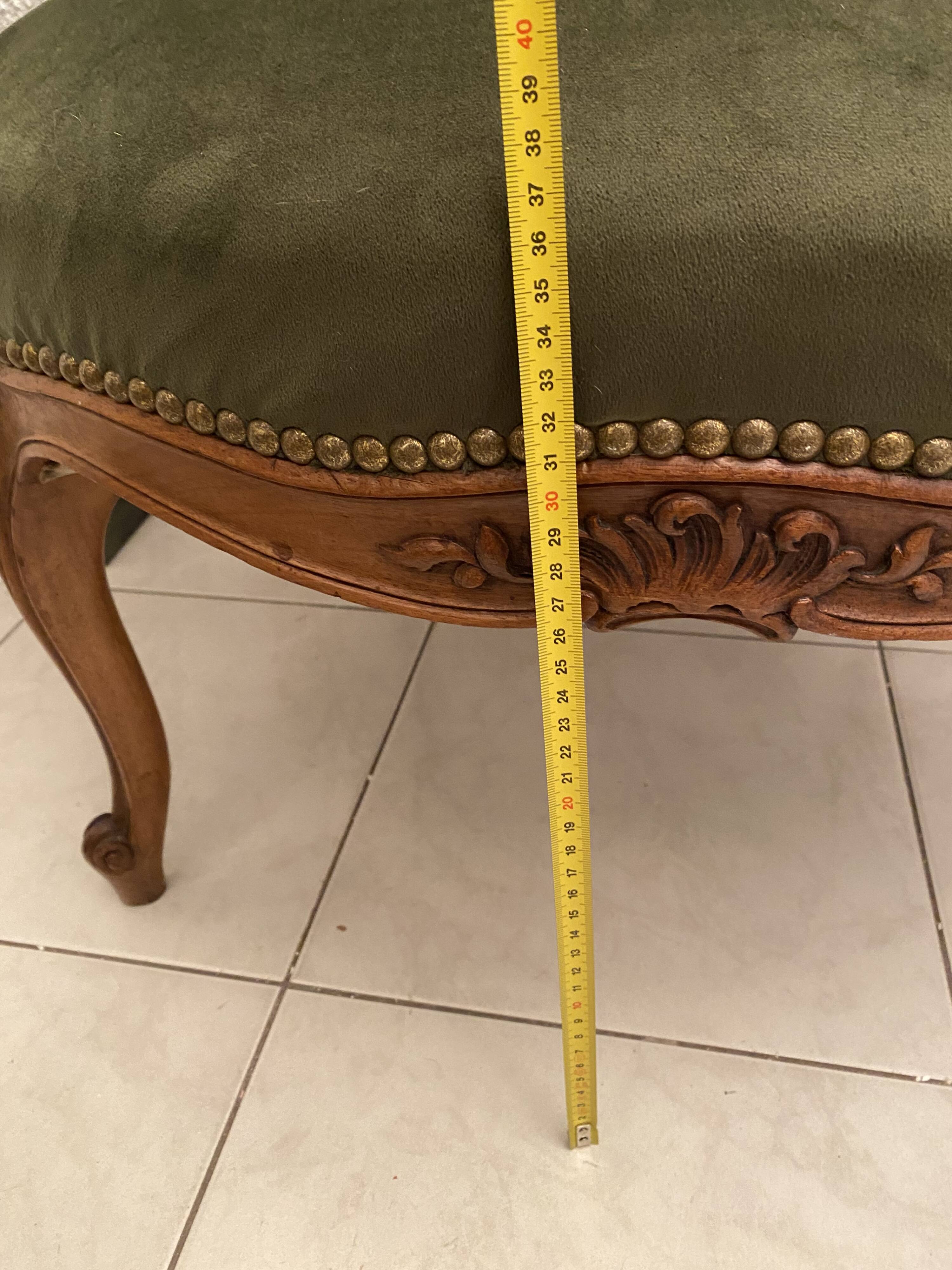 Paire de fauteuils en bois sculpté, XXème s.