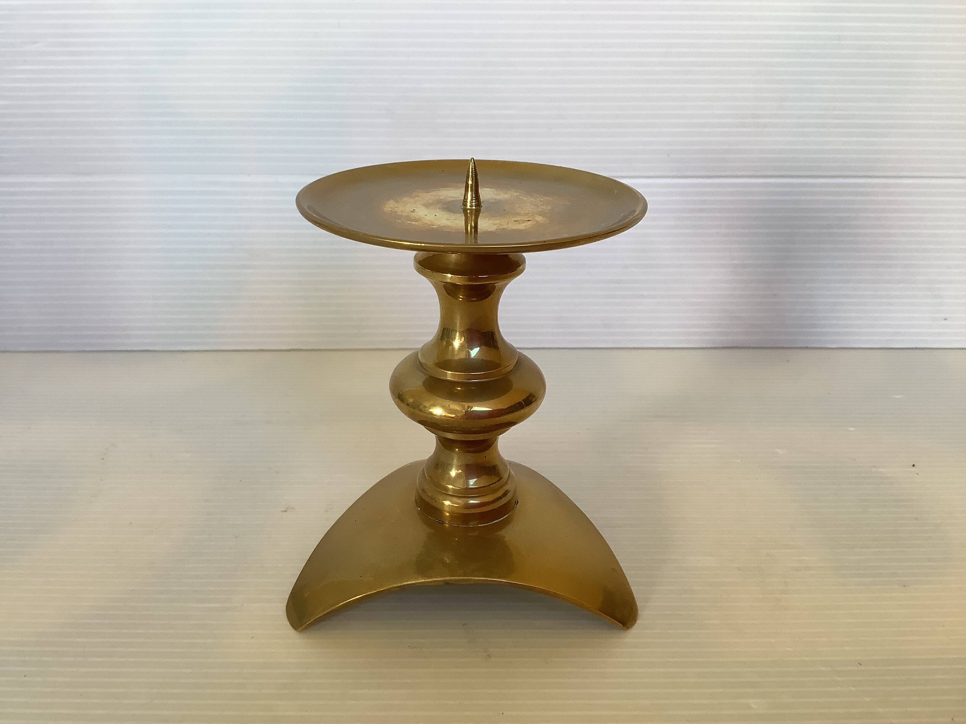 Tripod candlestick in brass