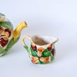 Tea service consisting of a teapot, a milk jug and a numbered hazelnut slip sugar bowl