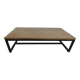 Industrial style coffee table with wooden top supported by a metal base -