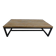 Industrial style coffee table with wooden top supported by a metal base -