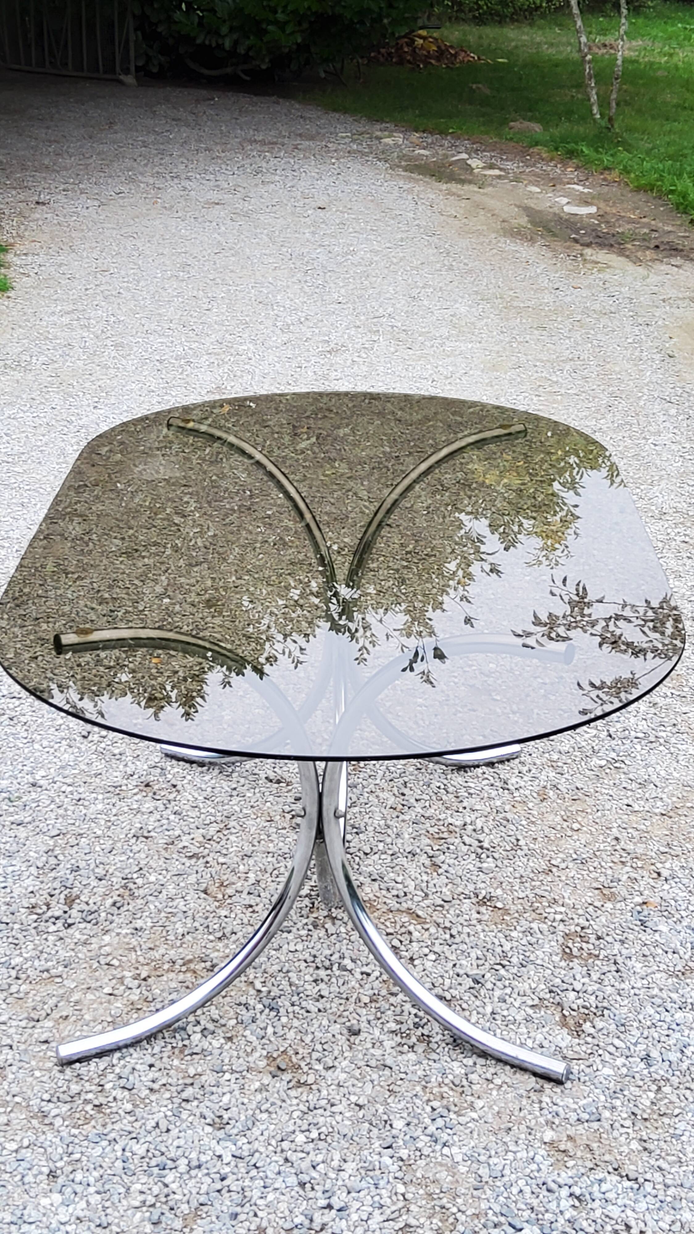 Dining table from the 70s top smoked glass base chrome
