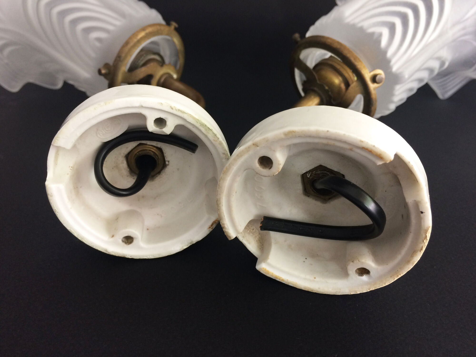 Pair of brass swan collar wall sconces, porcelain fastening. Vintage