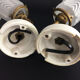 Pair of brass swan collar wall sconces, porcelain fastening. Vintage