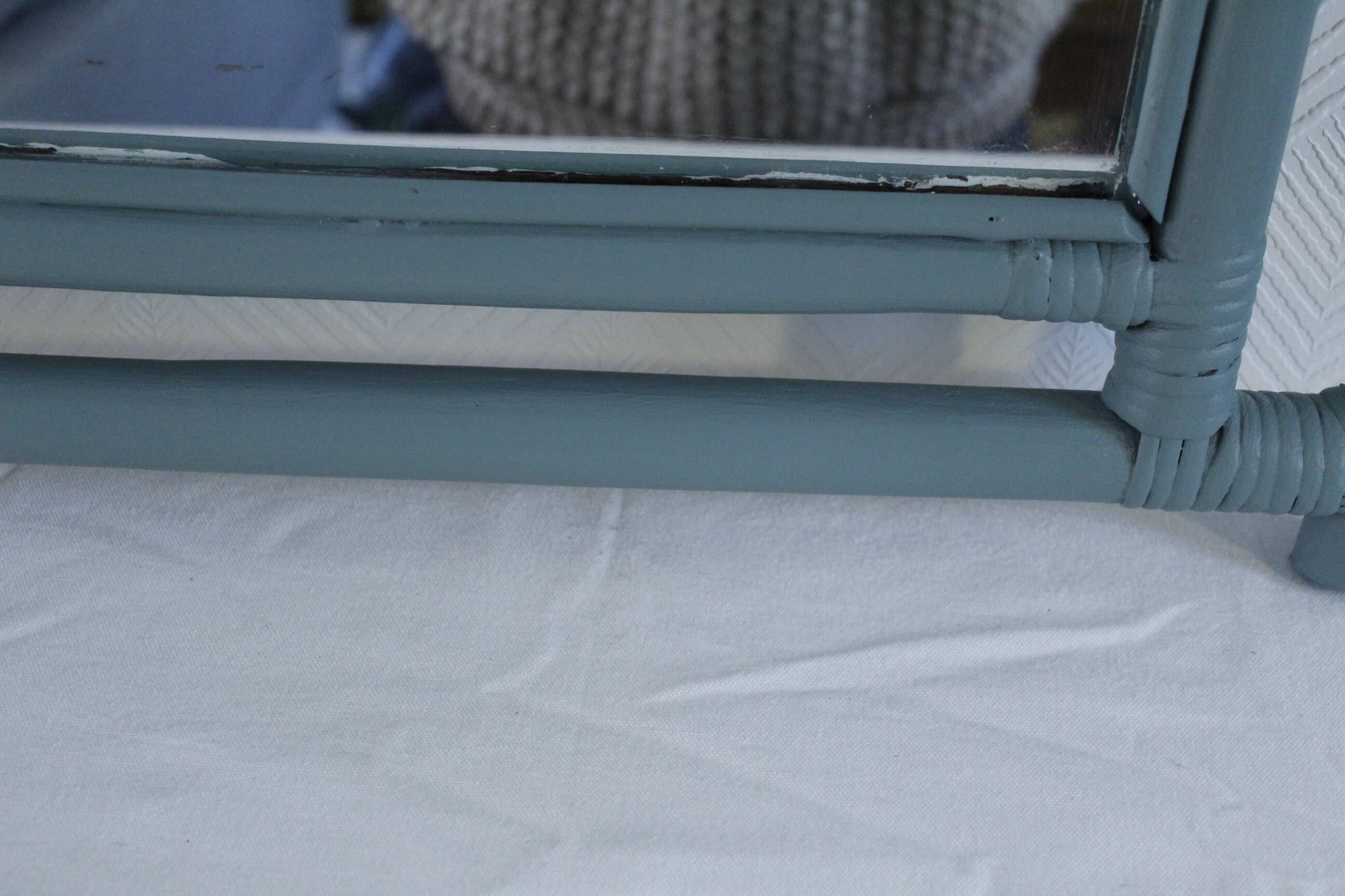 Sage green painted rattan mirror