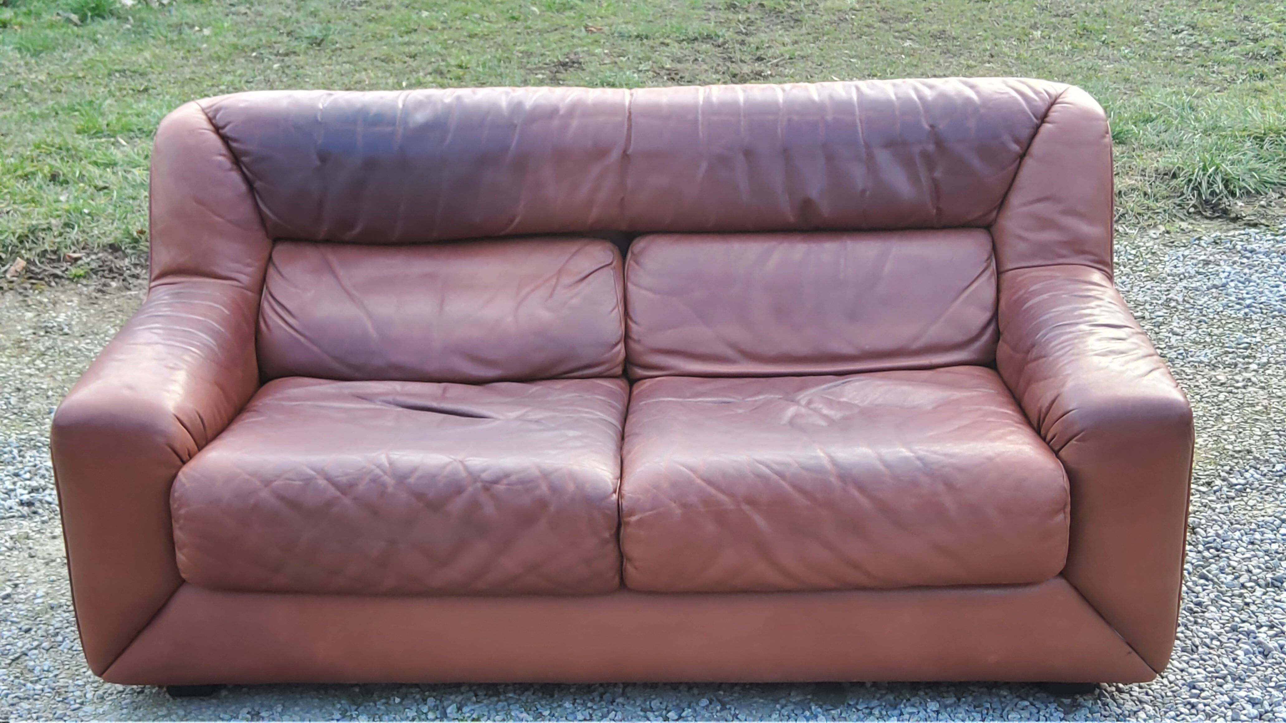 Pair of armchairs and De Sede sofa in cognac leather from the 70s/80s