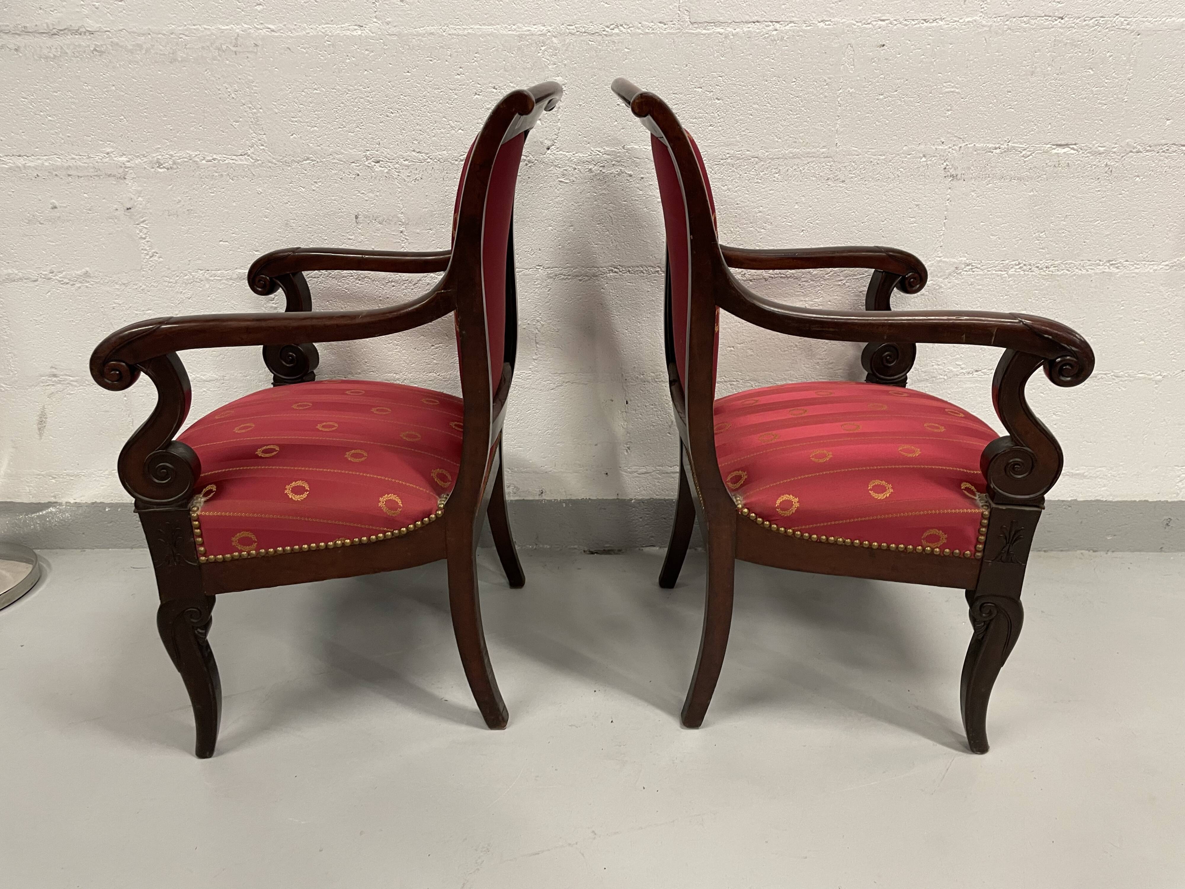 Pair of empire period armchairs in mahogany and silk