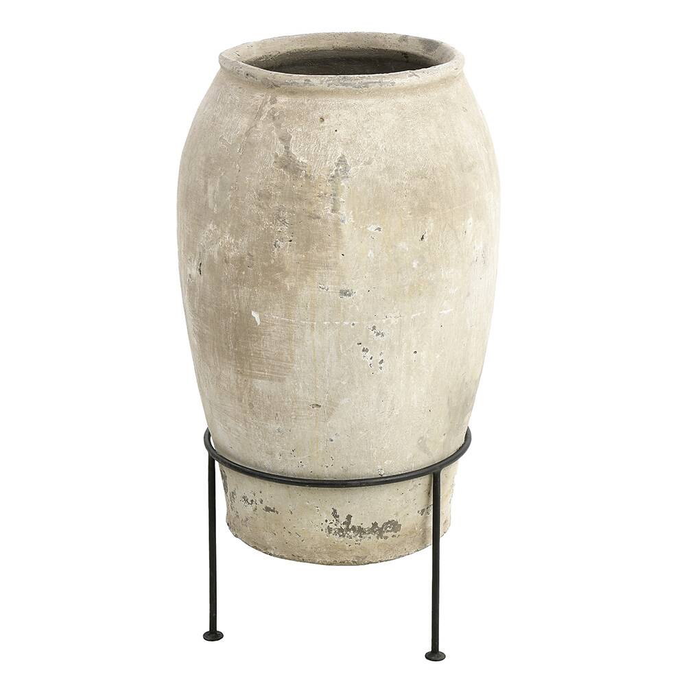 Large terracotta jar on foot