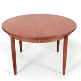 Scandinavian extendable teak dining table for 4/8 people.