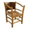 Rustic armchair in wood and cowhide