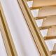 Tension pole free standing rose gold aluminum Omni wall unit by George Nelson