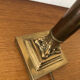 Ancient lamp foot candlestick corinthian column in bronze