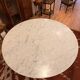 Grande table tulipe années 60, plateau en marbre de Carrare