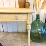 Old farmhouse table with central drawer