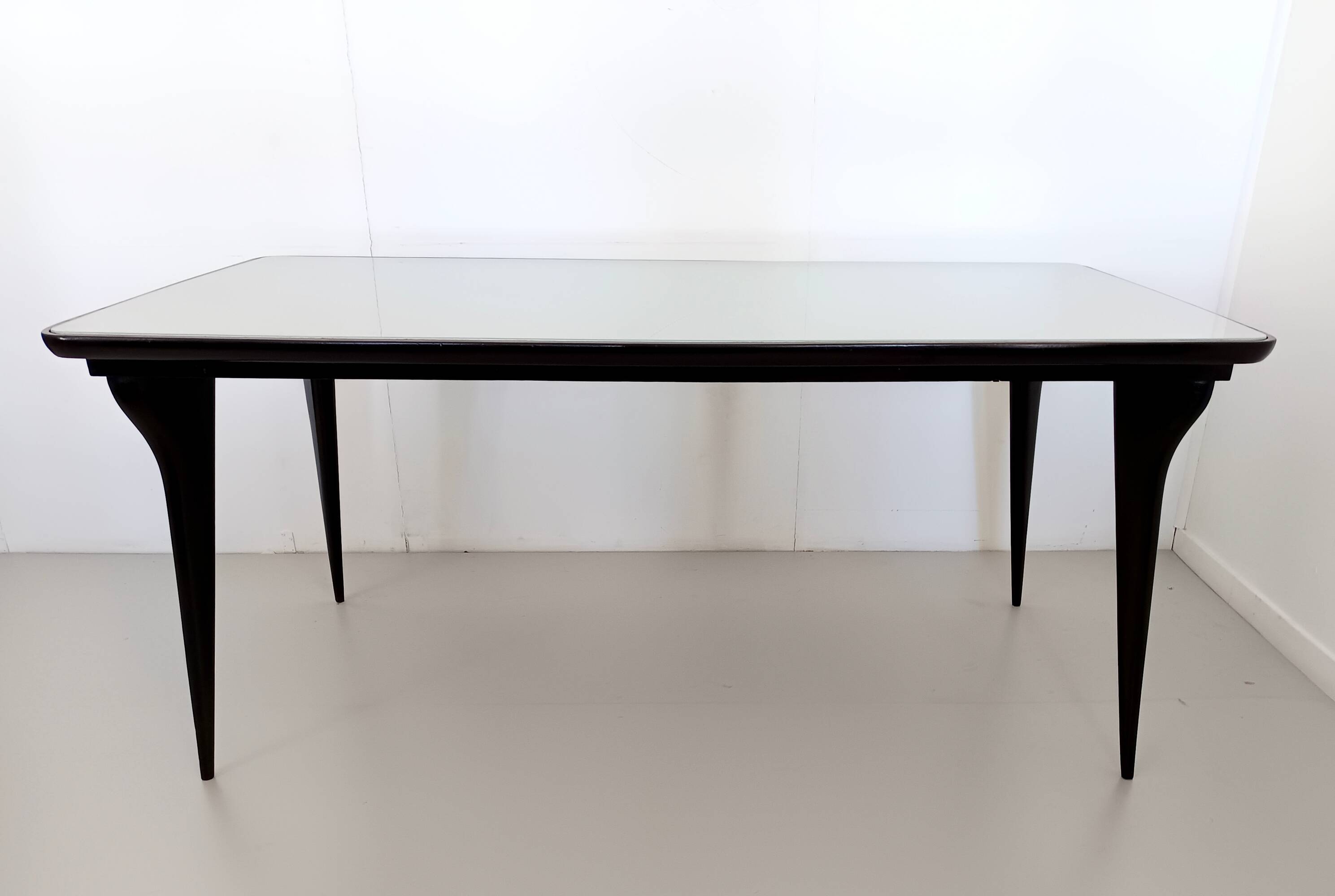 Dining Table with a Pale Green Glass Top