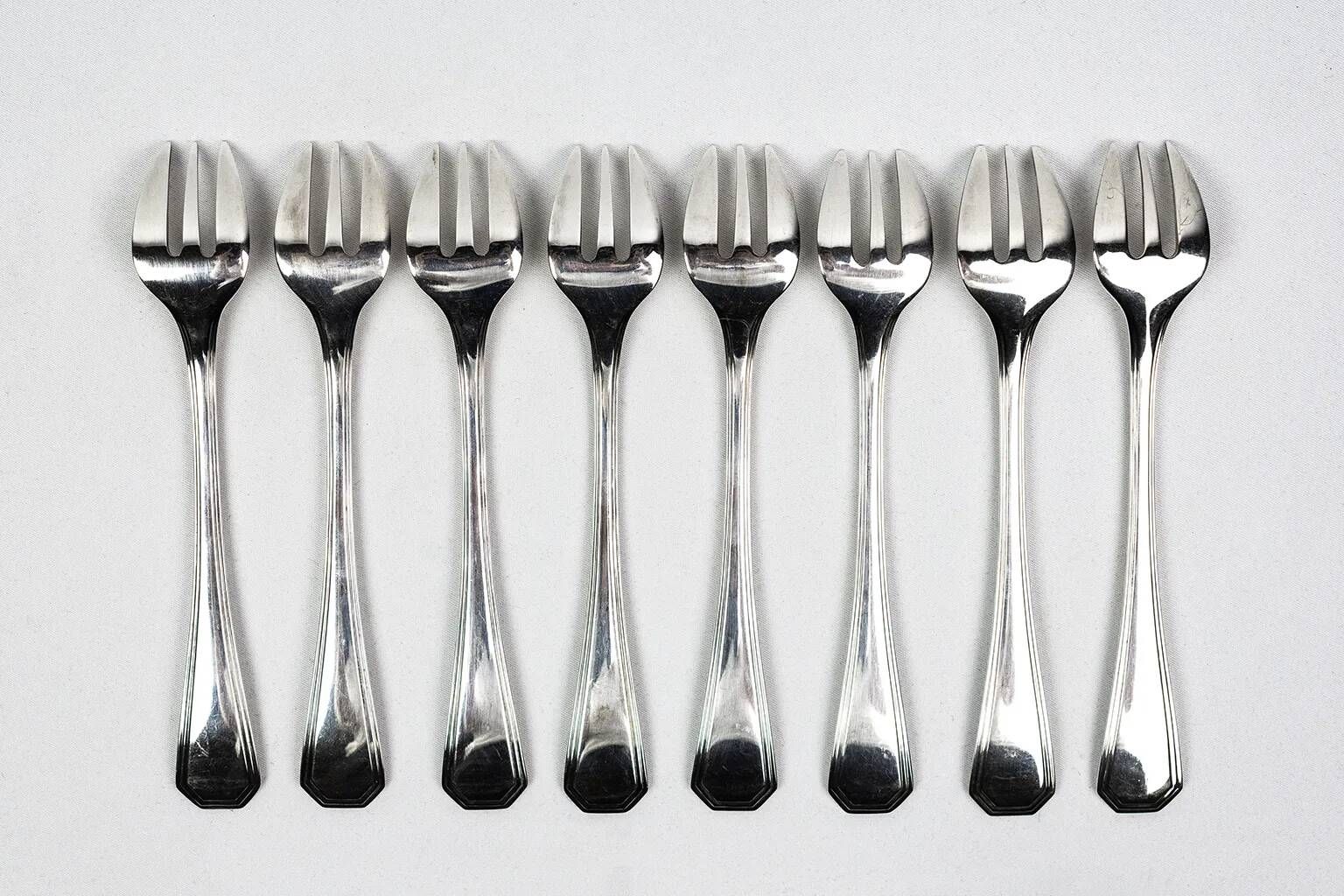 8 Christofle America silver-plated oyster forks, Luc Lanel