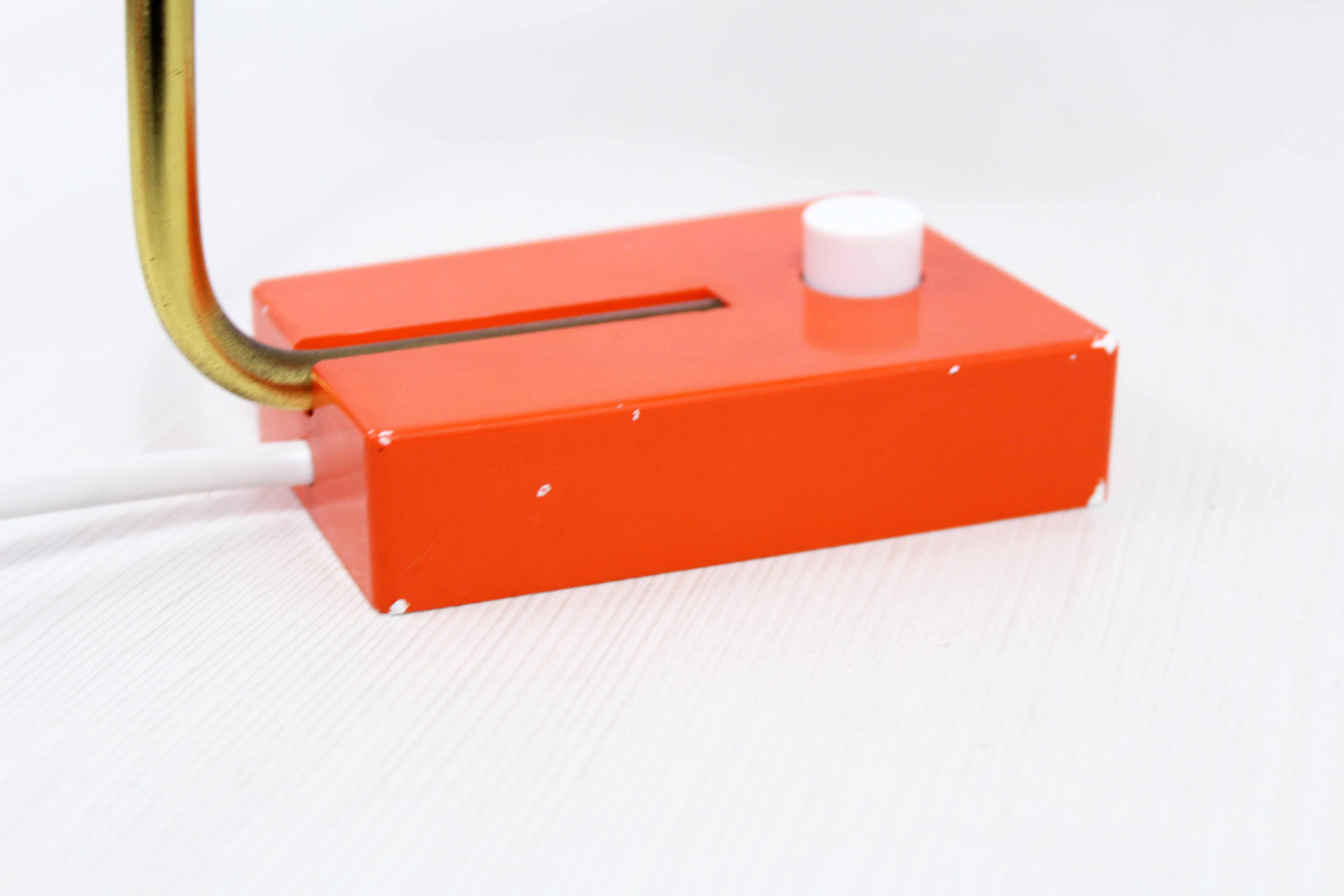 Vintage lamp in orange metal