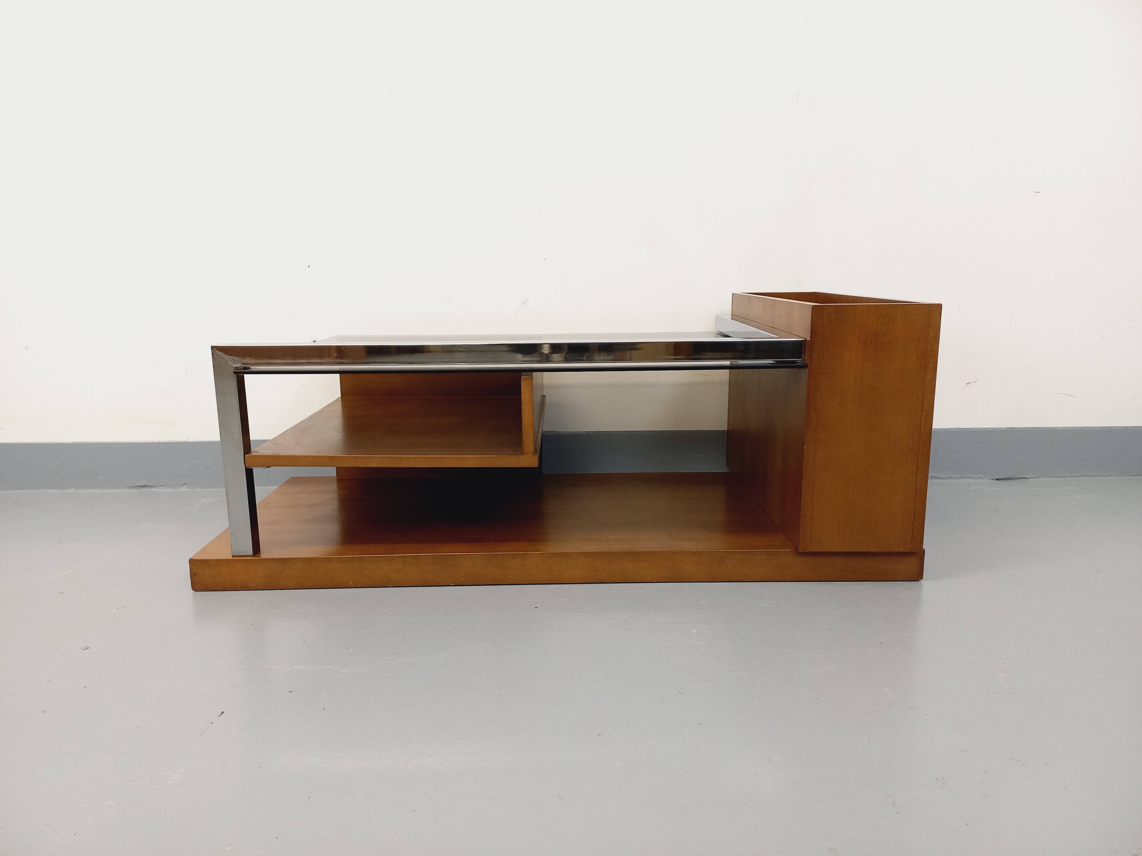 Rectangular vintage modernist coffee table with wooden niches, chrome.