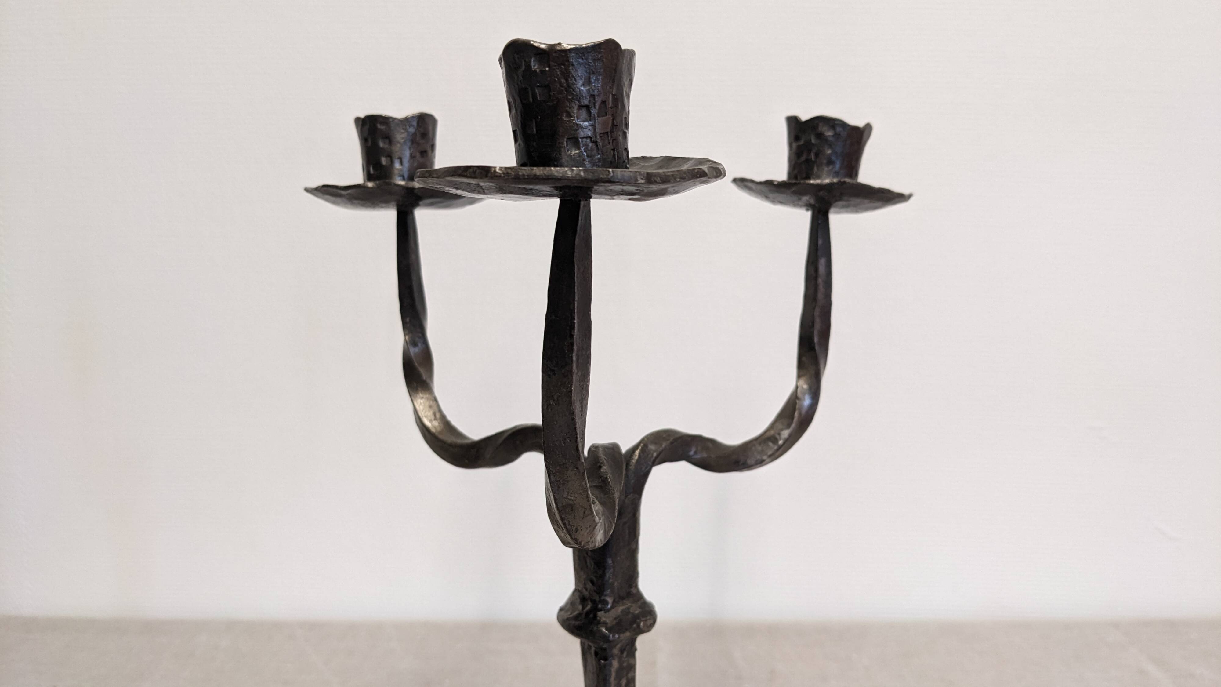 Brutalist candelabrum with 3 lights in wrought iron, France circa 1950.