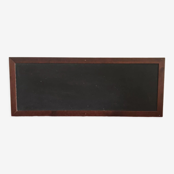 Rectangular wooden frame with slate black background