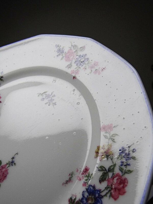 7 assiettes à dessert Bernardaud porcelaine de Limoges décor floral années 20-50
