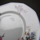 7 dessert plates Bernardaud Limoges porcelain with floral decoration from the 1920s to 1950s.