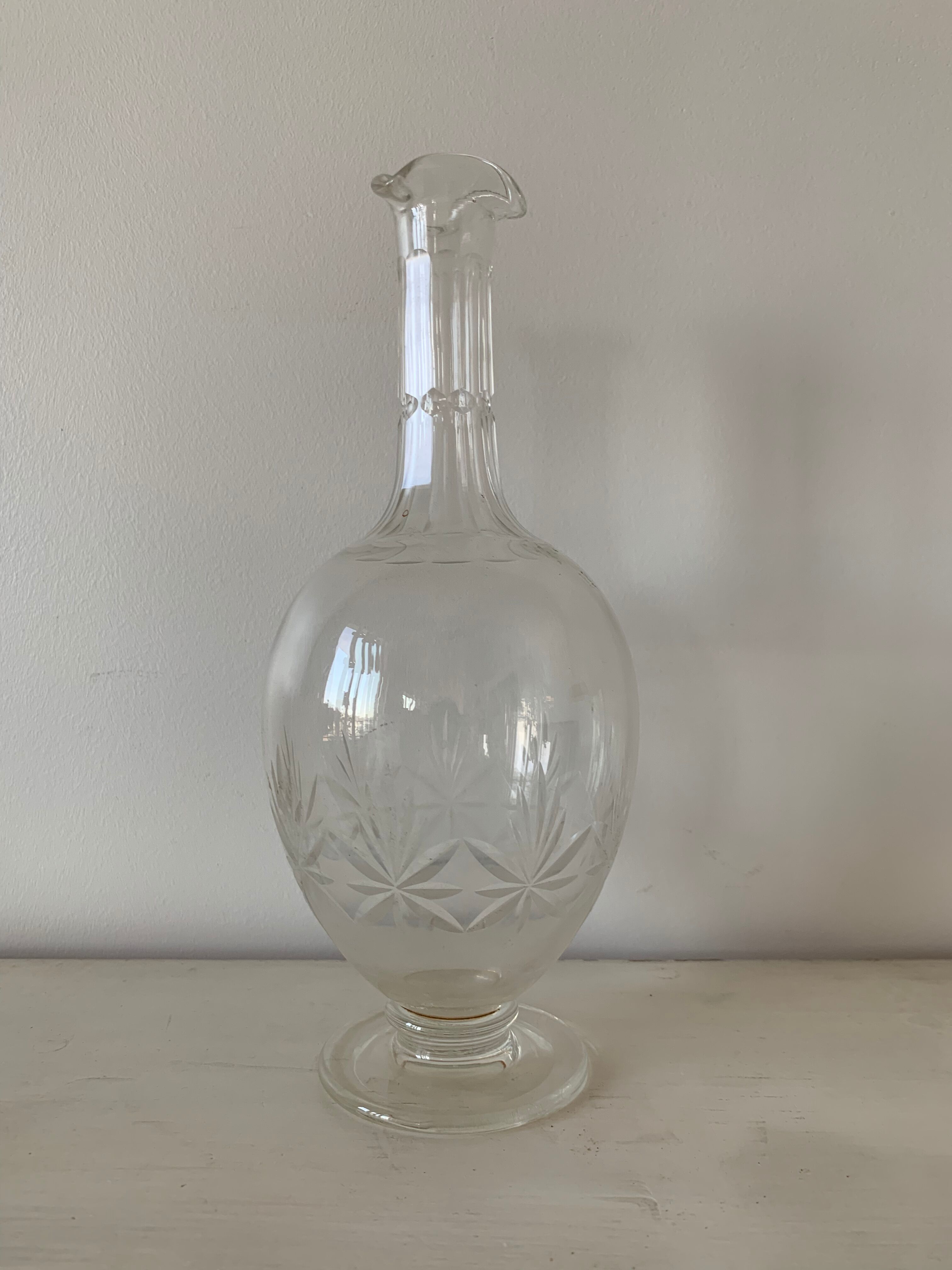 Old chiseled glass carafe