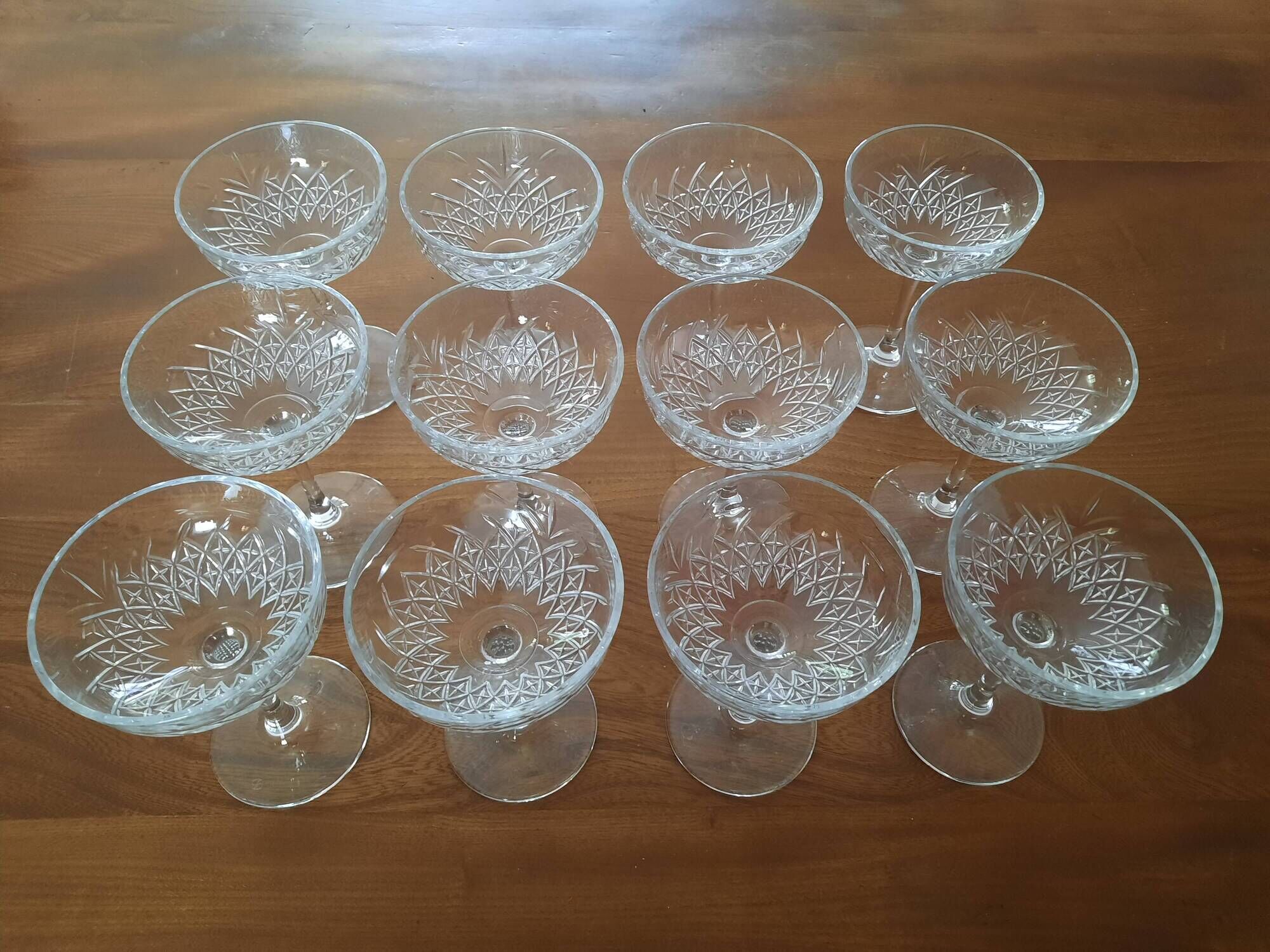 Set of 12 cut glass champagne glasses monogrammed EB.
