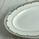 Oval presentation plate Saint Amand with bicolour floral decoration.