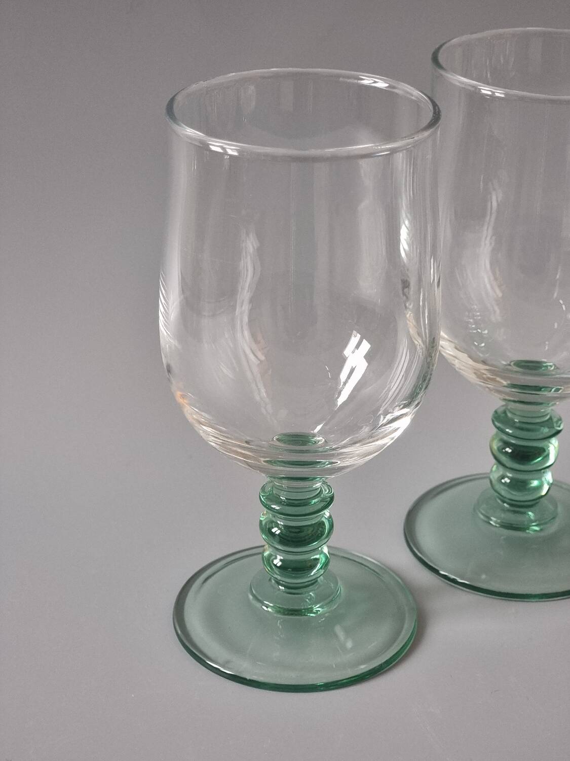Green stemmed glasses