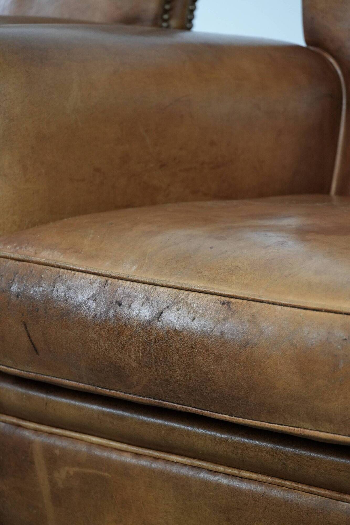 Set of two vintage sheepskin armchairs with beautiful and warm colours