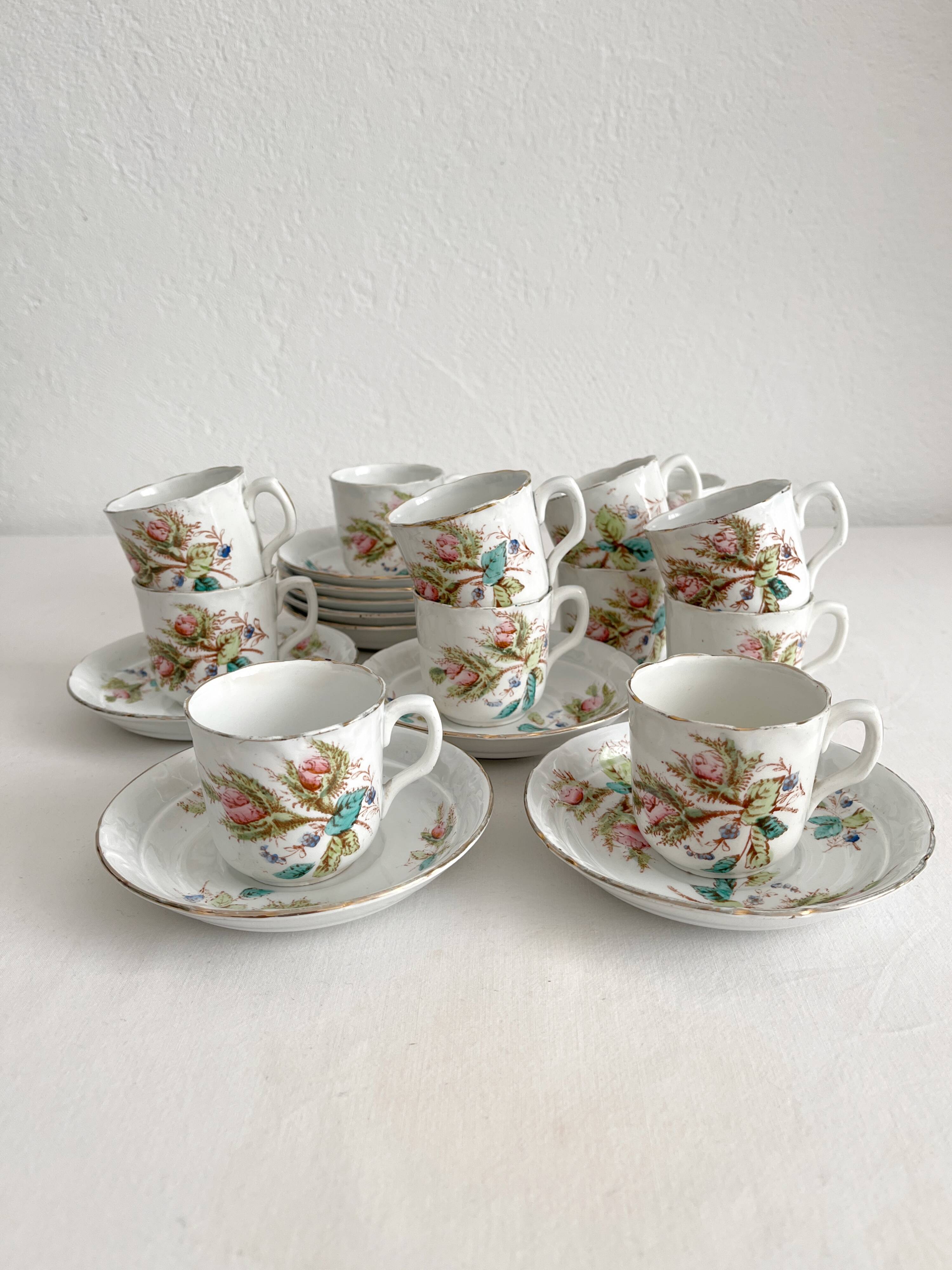 12 ironstone coffee cups with polychrome floral decoration, KG Lunéville