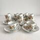 12 ironstone coffee cups with polychrome floral decoration, KG Lunéville