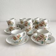 12 ironstone coffee cups with polychrome floral decoration, KG Lunéville