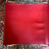 2 tubular chairs in red leather 1970
