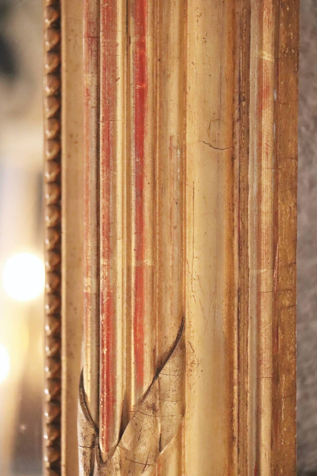 Manor house trumeau mirror in gilded wood, 19th century