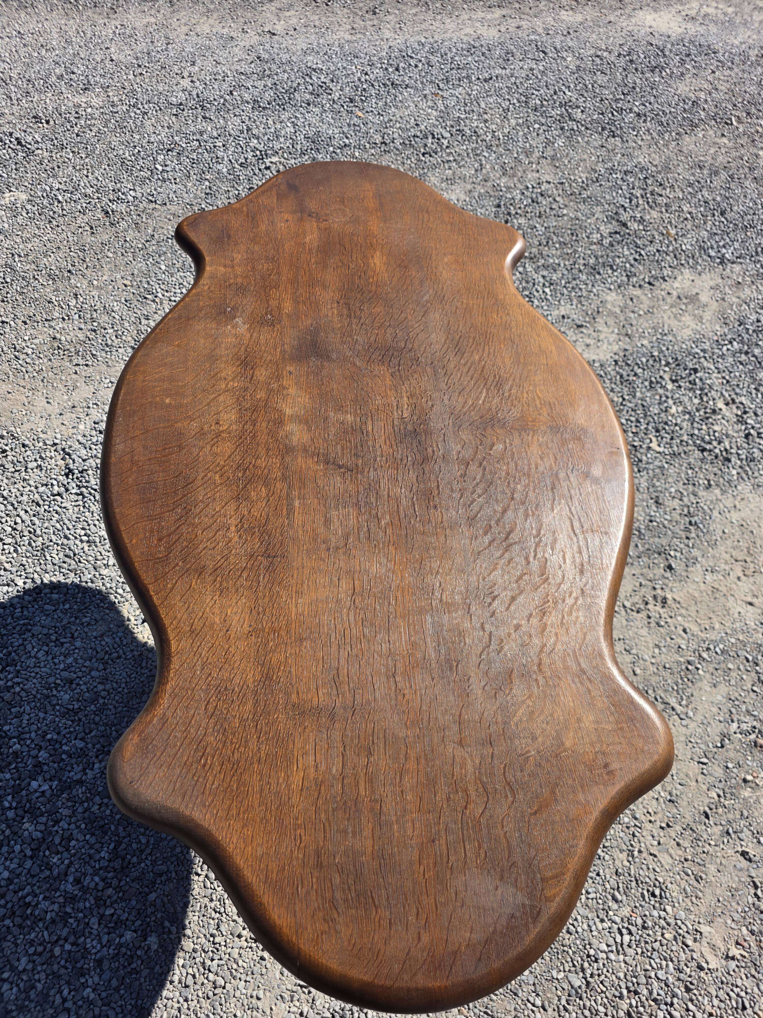 Antique round table in solid oak