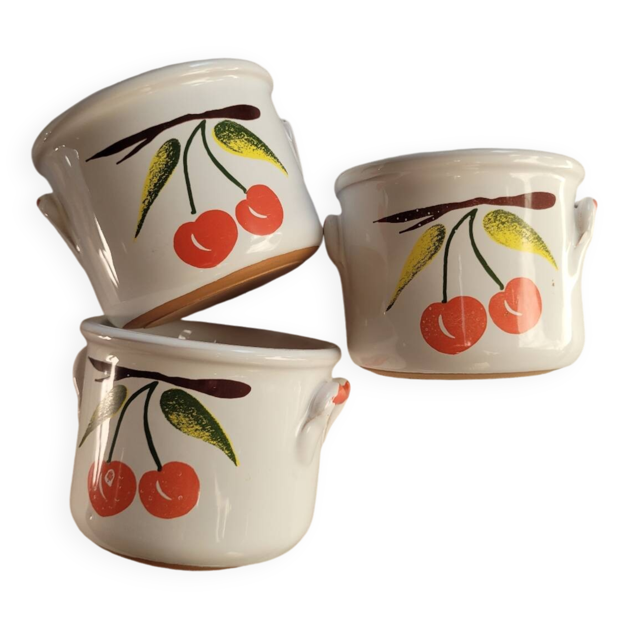 Glazed earthenware terrines with cherries