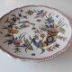 Assiette en faïence de Rouen corne d'abondance signée
