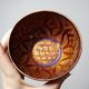 Pair of vintage hand-crafted blue and copper enamelled bowls.