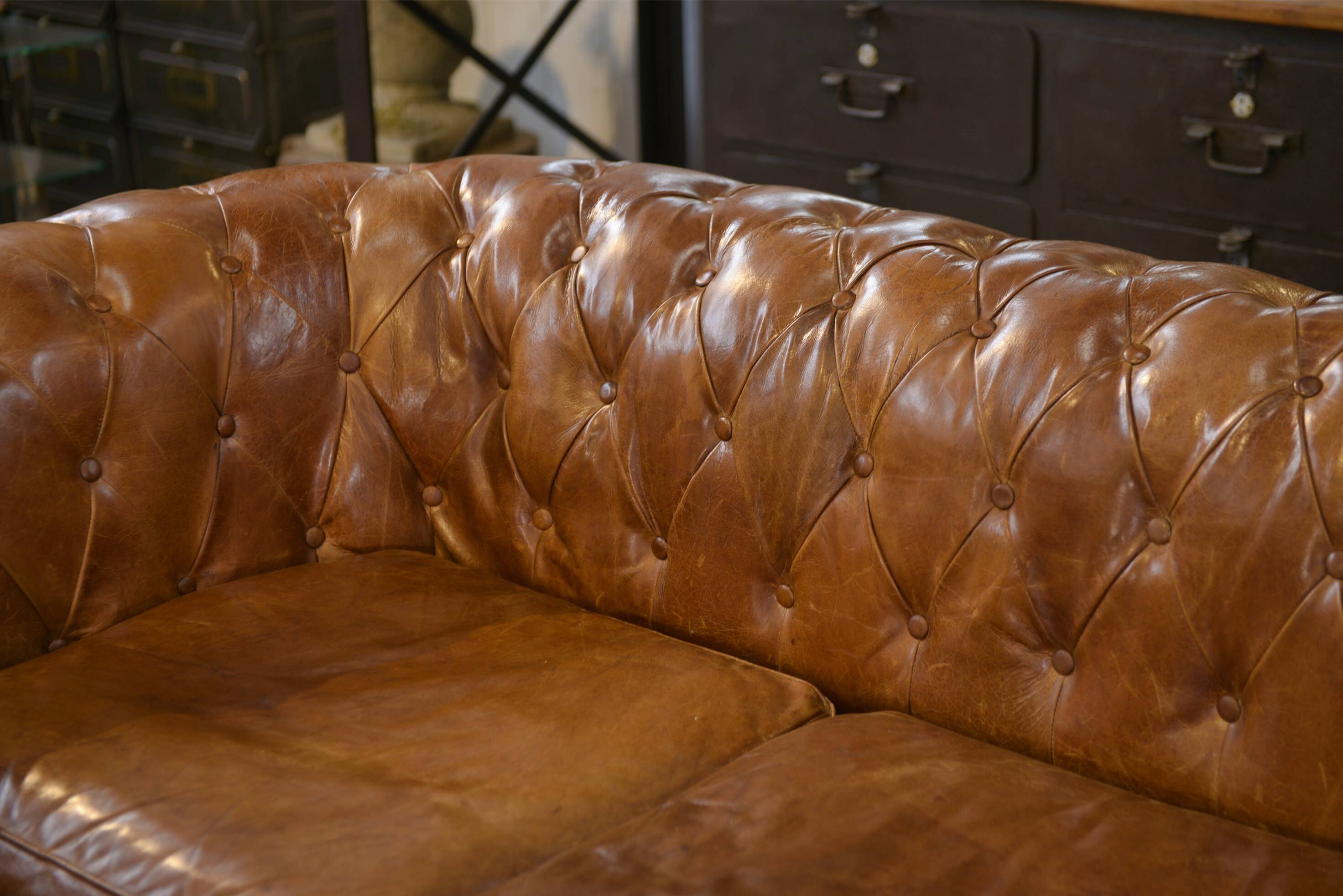 Brown leather Chesterfield sofa