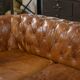 Brown leather Chesterfield sofa