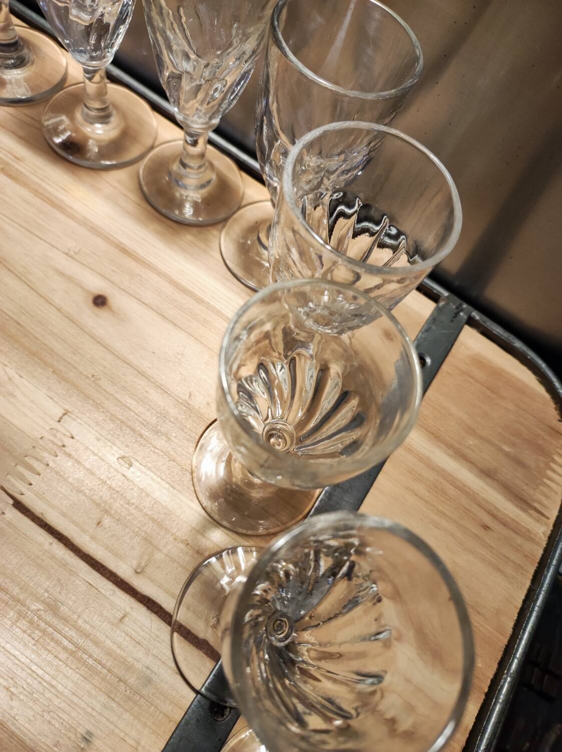 12 small twisted bistro glasses, 19th century
