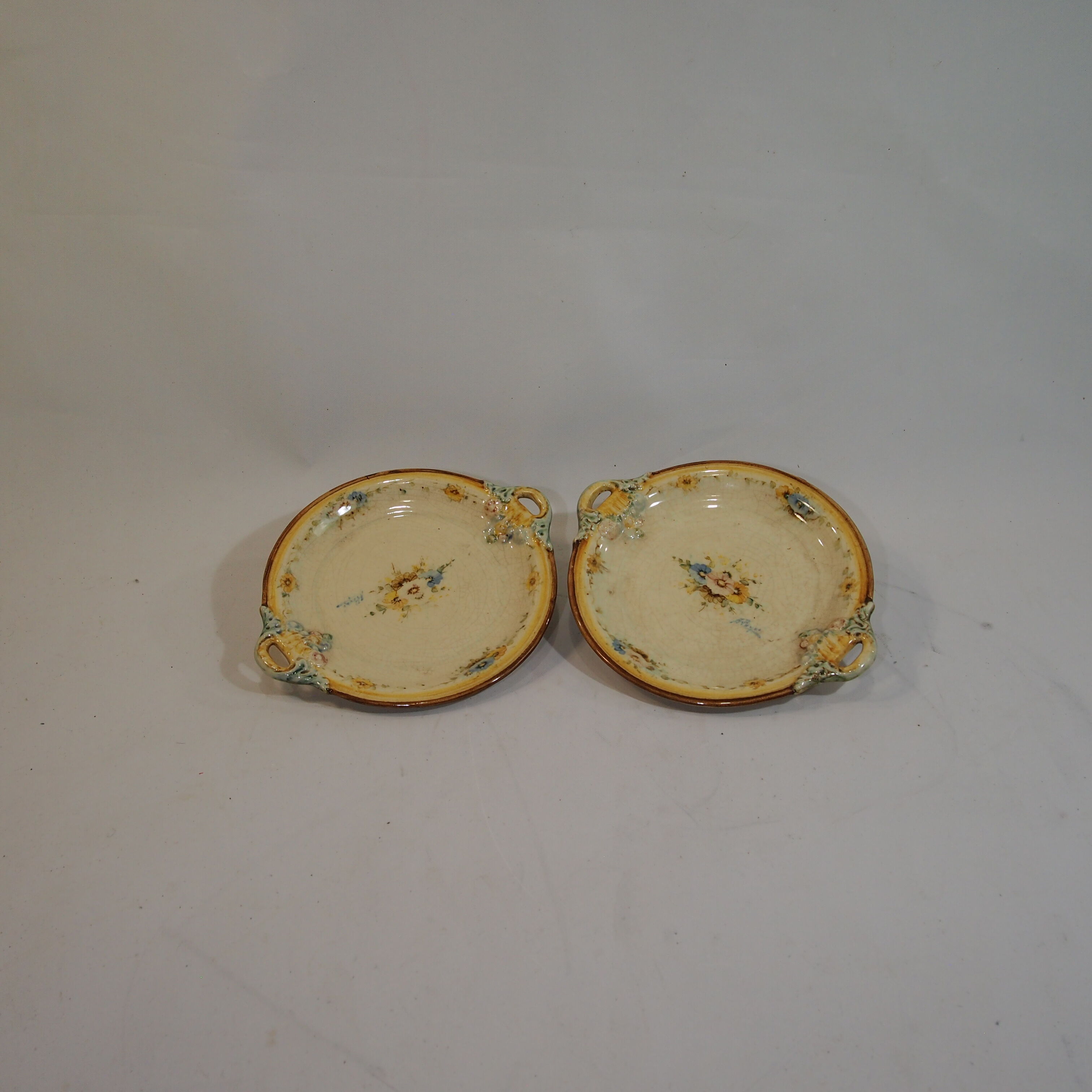 Pair of ceramic plates signed Antonio Peyro