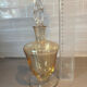 Carafe vintage en verre avec bouchon sculpté